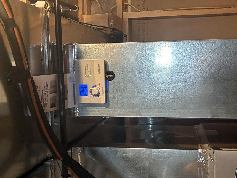 Successfully completed installation of a new 600 model humidifier for the customer. Removed existing equipment, installed the replacement unit, and verified proper connection to the ductwork and control system. System is now functioning correctly with the digital control panel showing appropriate readings.