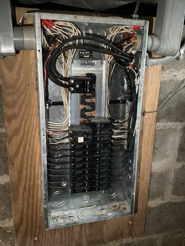 Installed a dedicated 20A circuit for kitchen microwave in 165-year-old home, running new wiring from basement electrical panel to kitchen cabinet. Performed load calculation to ensure panel capacity could support additional circuit and tested installation for proper voltage and grounding.