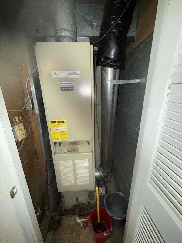 Responded to customer complaint of burning odor throughout home. Inspection revealed dust buildup on heat exchanger causing burn-off during initial seasonal operation. Cleaned heat exchanger, verified proper condensate drainage system function, and confirmed normal furnace operation with no gas leaks.