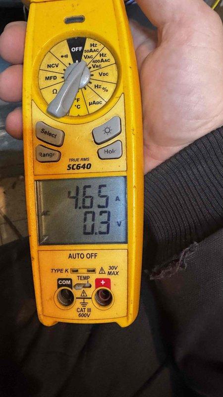 Diagnosed no heat condition on 19-year-old Lennox furnace, confirming cracked heat exchanger through multimeter testing and visual inspection of blower assembly. Explained warranty coverage for heat exchanger to homeowner and documented condition with detailed photos of electrical readings and blower wheel components.
