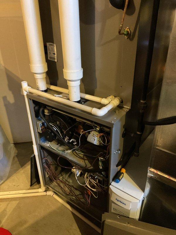 Diagnosed furnace intermittently blowing cold air after approximately 20 minutes of operation. Performed inspection of system components including circuit board, electrical connections, and ventilation. Examined Aprilaire humidifier installation and verified proper integration with HVAC system.