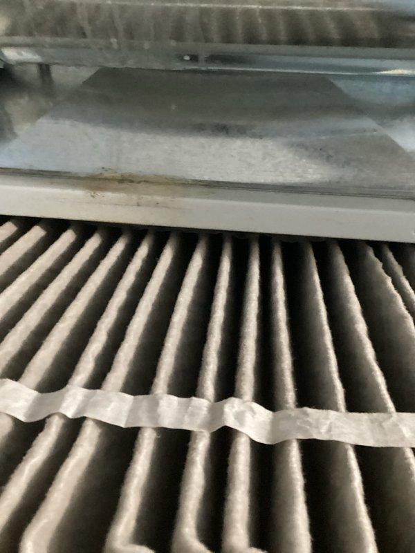 Performed routine maintenance on a 2-year-old gas furnace with MVP technology. Inspected the Aprilaire whole-home humidifier system, including all ductwork connections and associated plumbing components. Replaced pleated air filter which showed visible dust accumulation and documented system condition with photos for service records.
