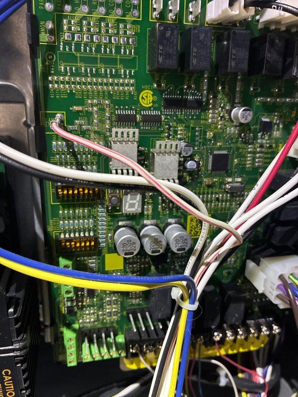 Performed scheduled MVP furnace maintenance service. Inspected foam insulation component with metal bracket support structure and conducted thorough examination of control board circuitry, noting proper connections of wire harnesses to the main circuit board with intact relay components.