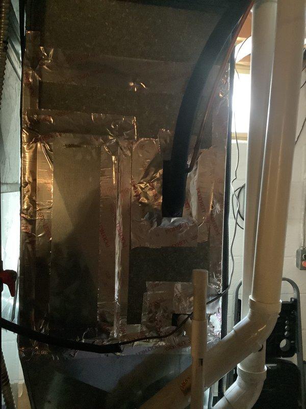 Performed inspection on 15-year-old furnace with confirmed cracked heat exchanger requiring full replacement. Documented condition of existing HVAC system including deteriorated interior insulation and connection points. Also assessed water heater installation with visible copper piping and pressure relief valve. Customer has scheduled follow-up appointment to review replacement options.