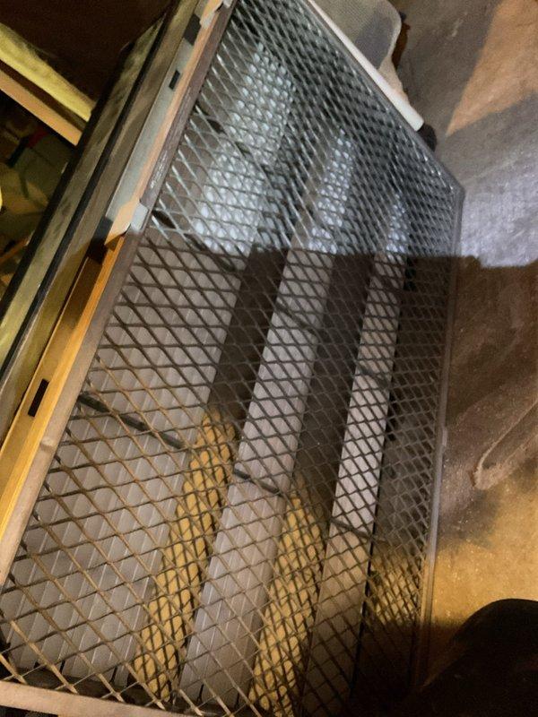 Performed routine maintenance on 3-year-old MVP gas furnace, including inspection of condensate drain system and examination of air intake components. Observed minor dust accumulation around drain base which was cleaned to ensure proper drainage function, and verified integrity of protective mesh covering on ventilation system.