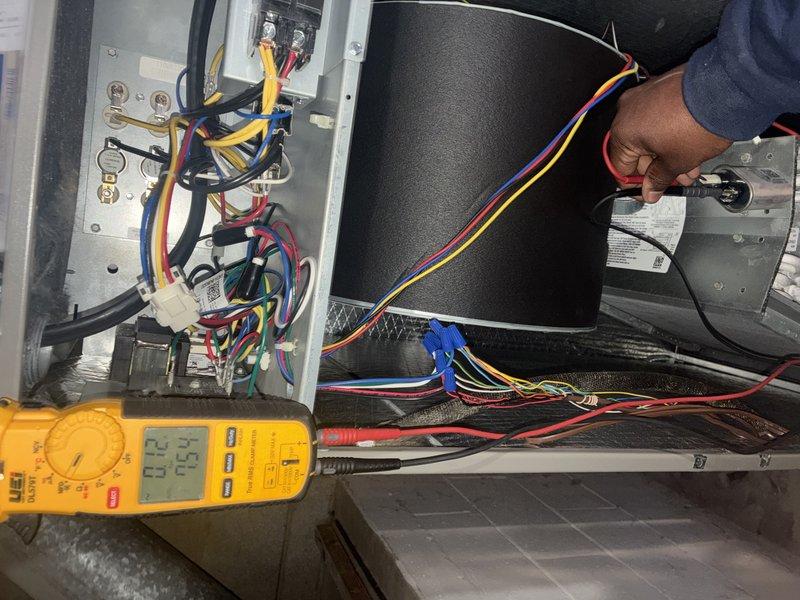 Performed comprehensive furnace tune-up service, including electrical system diagnostics with multimeter verification of proper voltage (20.5V) at control board. Inspected heat exchanger and evaporator coil assembly for integrity and cleanliness; all components found in good working condition with no visible corrosion or debris accumulation. Customer enrolled in maintenance value program for continued system care.