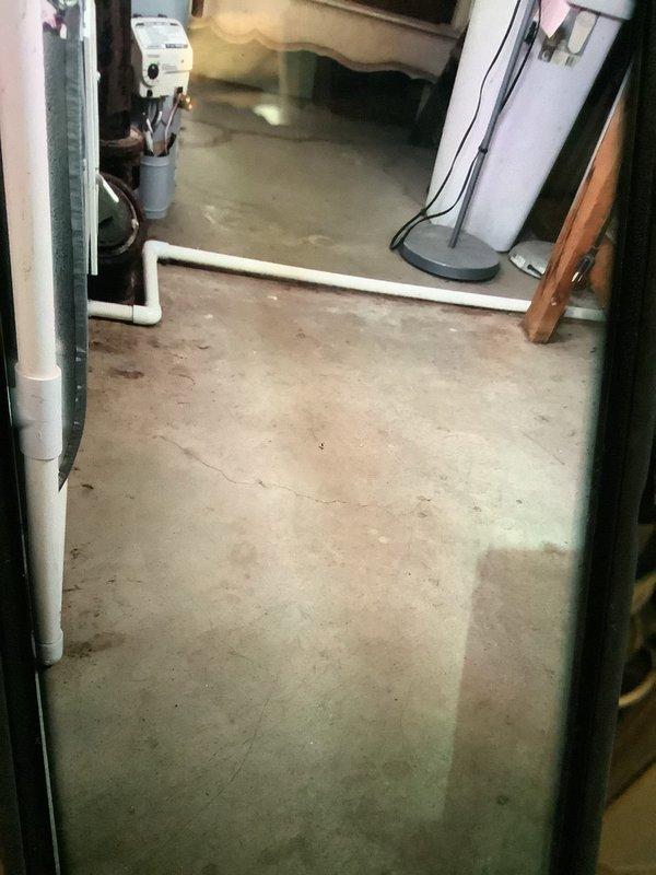 Performed diagnostic assessment on furnace system in response to "Outdoor wireless configuration controller" error message displayed on thermostat. Inspected air handler unit in basement utility area and verified filter condition - filter appears to be in good working condition with minimal soiling. Resolved communication issue between thermostat and outdoor unit by reconfiguring wireless controller settings.