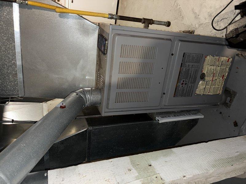 Responded to no-heat call for residential gas furnace. Upon inspection, found faulty flame sensor preventing ignition sequence completion. Cleaned flame sensor using emery cloth to remove carbon buildup, verified proper ignition sequence, and confirmed normal operation through complete heating cycle. System now functioning correctly with proper flame detection.