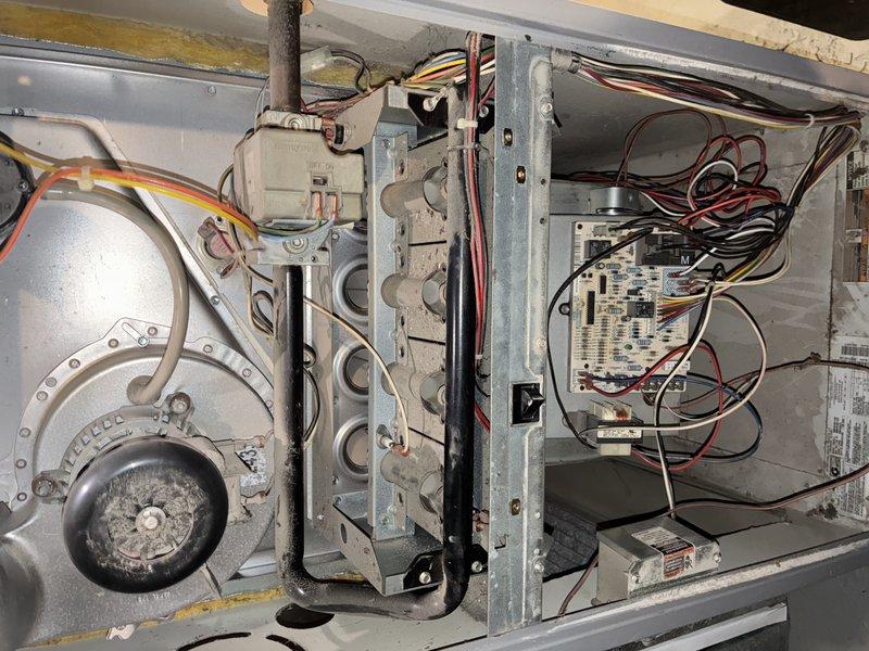 Responded to no-heat call for residential gas furnace. Upon inspection, found faulty flame sensor preventing ignition sequence completion. Cleaned flame sensor using emery cloth to remove carbon buildup, verified proper ignition sequence, and confirmed normal operation through complete heating cycle. System now functioning correctly with proper flame detection.