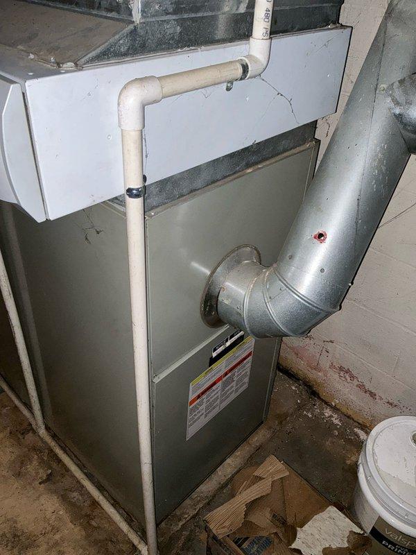 Conducted inspection of aging oil furnace system. Diagnosed failing blower motor and control board causing system to randomly overheat and consume excessive fuel. Both components require custom manufacturing from Trane as they are no longer available as standard parts. Recommended complete system replacement as repair costs are prohibitive and current condition poses efficiency and safety concerns.