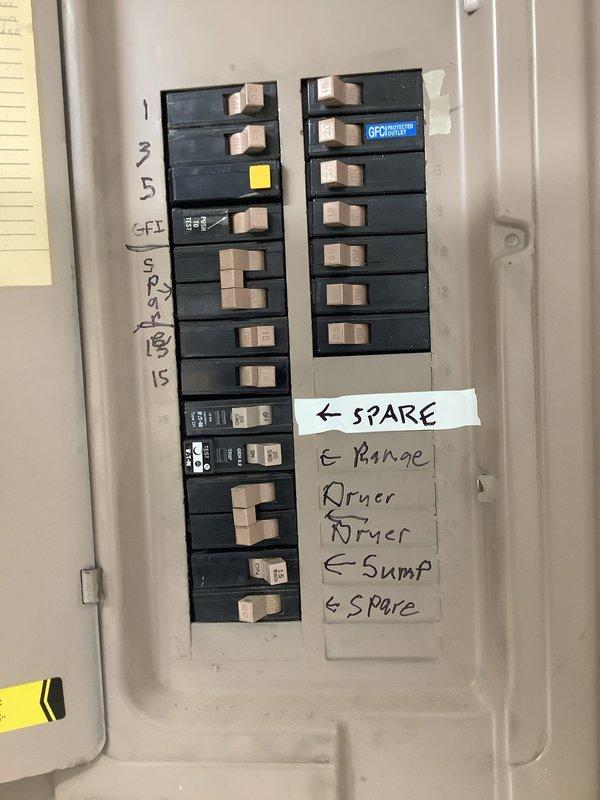 Converted 240V circuit previously used for electric range to accommodate dedicated microwave installation. Reconfigured wiring with existing conductors (repurposed ground to bare, red to neutral, maintaining black as hot) and verified 20A breaker protection. Installed recessed outlet in cabinet for microwave connection and added junction box with receptacle for future gas range. Confirmed 120V operation with digital voltage tester.