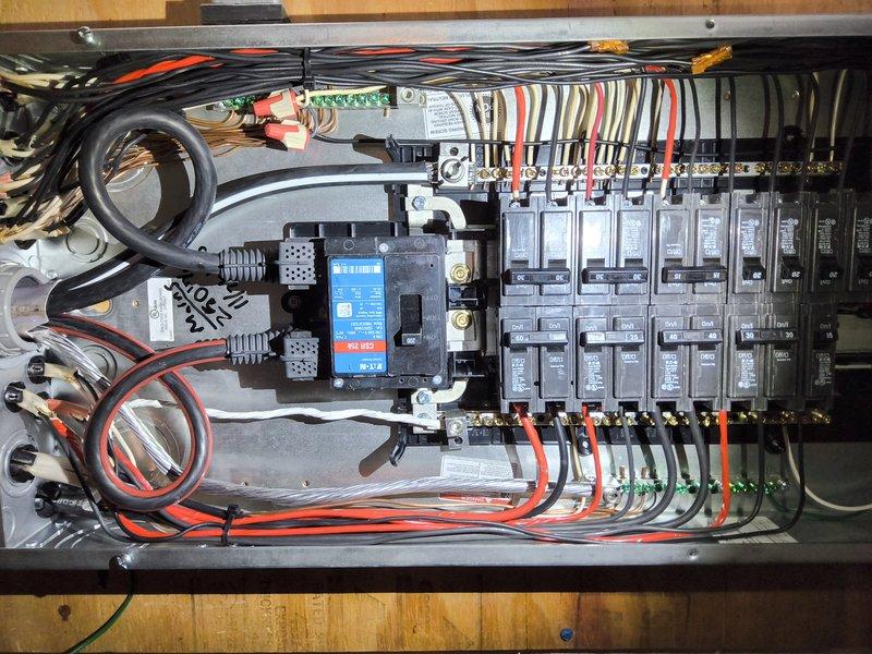 Corrected wiring connection issues in main electrical panel and ground system that previously failed inspection. Reworked improper connections according to code requirements and prepared system for reinspection. Documentation photos taken of interior panel configuration and exterior service entrance to verify compliance with electrical standards.