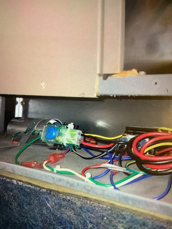 Performed scheduled MVP Heating maintenance service that was rescheduled from previous date. Inspected control wiring connections and examined evaporator coil, noting dust accumulation and minor oxidation on the aluminum fins. Documented system condition with photographs for service record.