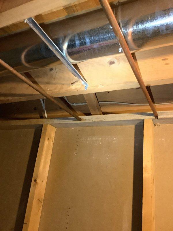 Responded to service call for main valve replacement. Upon inspection of the exposed ceiling area, accessed copper water supply lines and removed the existing main valve. Installed new main valve with proper soldering techniques, ensuring secure connection at the elbow joint. Verified system integrity with pressure test after installation.