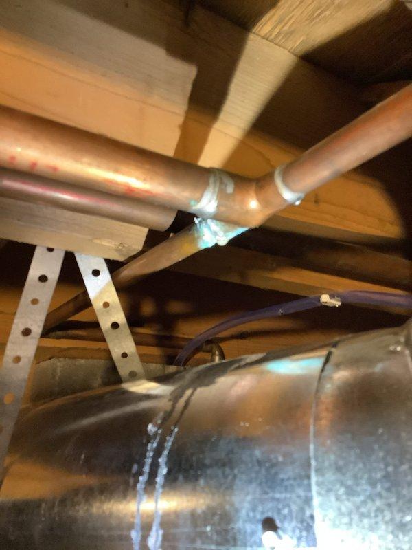 Responded to service call for main valve replacement. Upon inspection of the exposed ceiling area, accessed copper water supply lines and removed the existing main valve. Installed new main valve with proper soldering techniques, ensuring secure connection at the elbow joint. Verified system integrity with pressure test after installation.