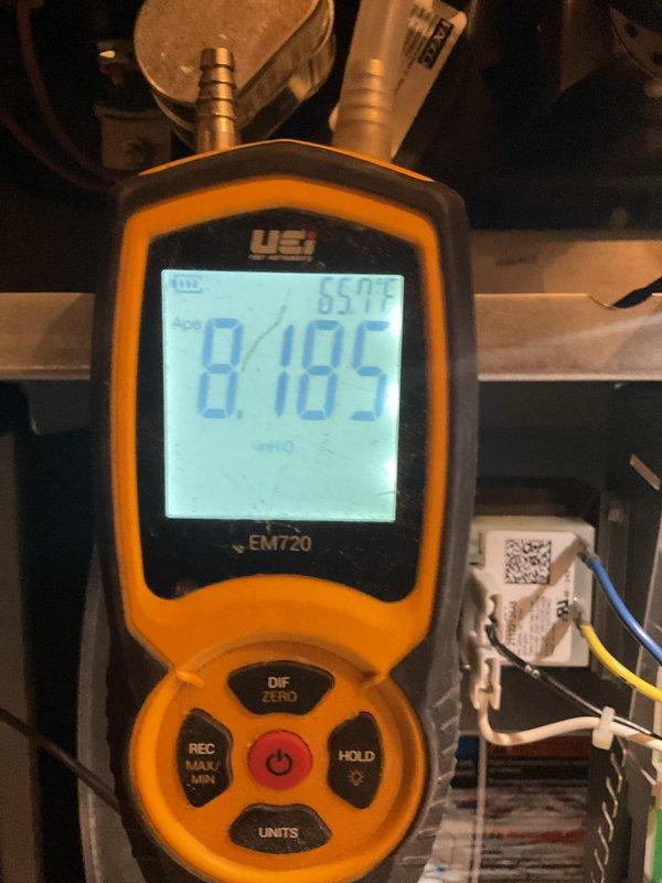 Completed scheduled heating maintenance service that was previously rescheduled. Performed system diagnostics using UEi EM720 meter, recording temperature readings of 65°F and electrical measurements of 8.185. Accessed internal components with hex key to inspect wiring connections and copper lines, ensuring proper system operation.
