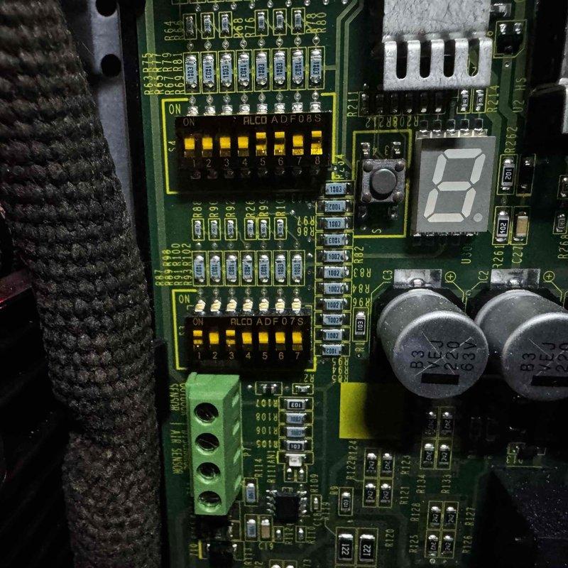 Performed diagnostic testing on 2-year-old gas furnace that was reported for noise concerns. Inspected control board circuitry, specifically examining the ALCO ADF 08S dip switch settings. Conducted gas pressure testing using digital manometer, confirming proper pressure readings at 0.00 inWC. System restored to normal operation with noise issue resolved.