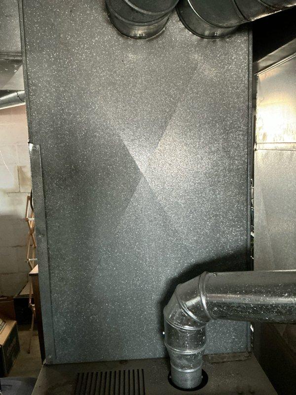 Successfully completed installation of an 80,000 BTU furnace as first job of the day. Installed unit in basement/utility area with proper connection to existing ductwork system, including connection to metal ductwork with appropriate elbow joints. Verified system operation and ensured all manufacturer specifications were met.