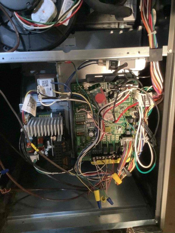 Performed routine MVP furnace maintenance service, inspecting the control board and electrical connections. Examined interior components including circuit boards, wiring harnesses, and blower assembly. All systems functioning properly with no issues identified during the service visit.