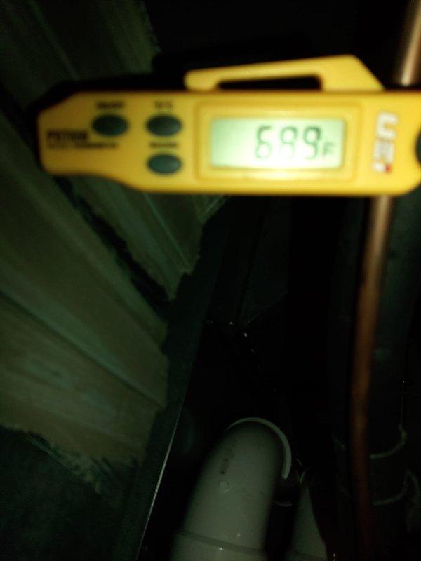 Completed full system installation at residence with existing mold issues on exterior siding. Performed temperature diagnostics during startup, confirming proper system operation with readings of 699°F at the furnace exhaust. Installed new electrical connections including junction box mounted on exterior wall with appropriate conduit.