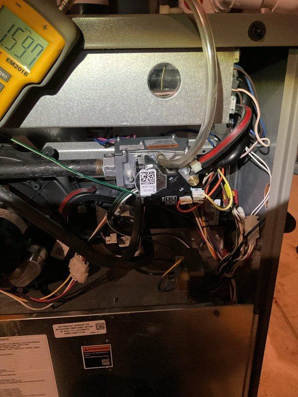 Diagnosed and confirmed internal gas leak in 4-year-old furnace, validating utility company's initial findings. Performed comprehensive inspection of gas valve, connections, and control components, documenting condition with detailed photos of internal system components.