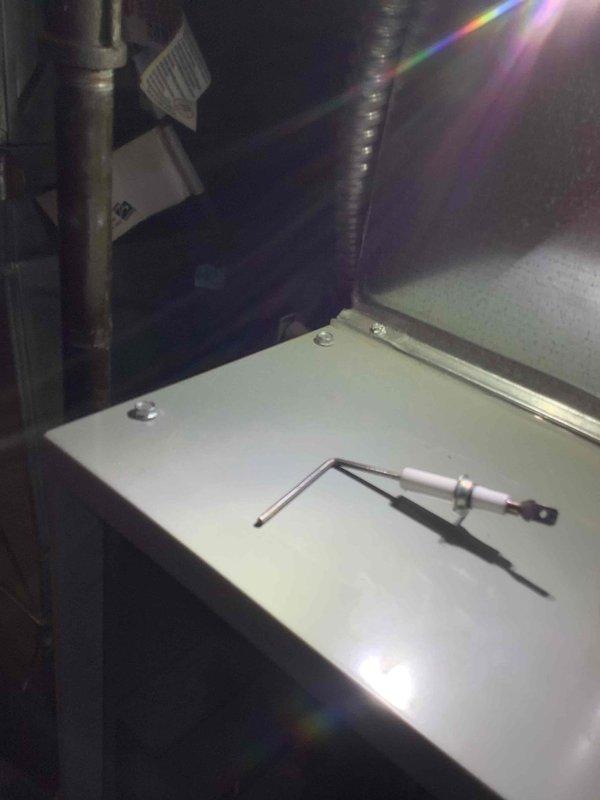 Performed scheduled furnace tune-up, inspecting system components and operation. Noted significant dust accumulation on blower wheel requiring cleaning to improve airflow efficiency. Utilized hex key tool to access and service internal components during maintenance procedure.