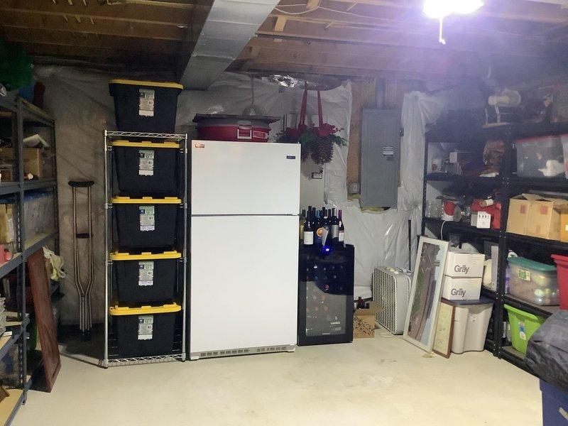 Conducted site assessment for tankless water heater installation, evaluating existing plumbing configuration with current tank-style water heater system. Documented current setup including water lines, gas connections, and venting requirements to prepare comprehensive installation estimate as requested by customer (440-897-4369).