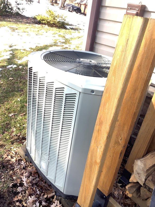 Conducted heat pump estimate for residential replacement. Assessed existing outdoor unit showing signs of age and wear. Documented current installation details including electrical connections and concrete pad placement for proper sizing of replacement system.