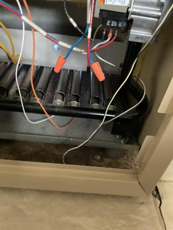 Performed scheduled boiler tune-up service, including inspection of burner assembly and electrical connections. Verified proper operation of control module and terminal connections. Inspected water heater/boiler tank, pressure gauge, and copper piping connections for leaks or issues. All components functioning correctly with no repairs needed.