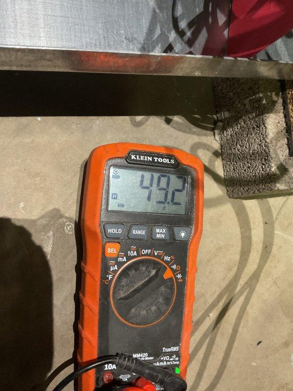 Performed routine MVP heating maintenance service on 3-year-old system. Conducted temperature and pressure measurements using UEi EM720 digital meter (recorded 84.0°F temperature and 0.072 inH2O pressure). Verified electrical parameters with Klein Tools multimeter showing 49.2 reading. System appears to be operating with staggered performance; customer advised about MVP renewal.