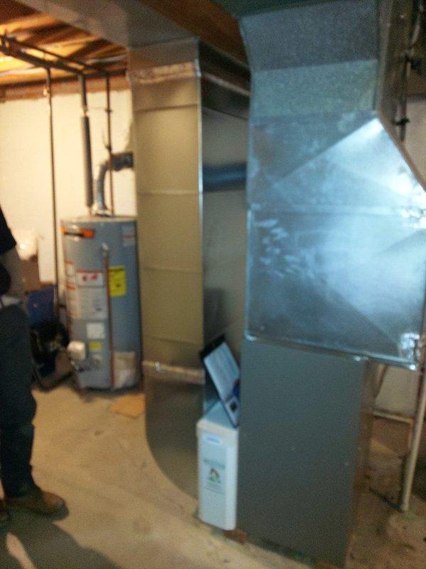 Completed installation of an 80% efficiency furnace in basement utility room. Installed new metal ductwork with proper connections to existing distribution system. System includes PVC drain lines and all required safety components, with final inspection confirming proper operation.