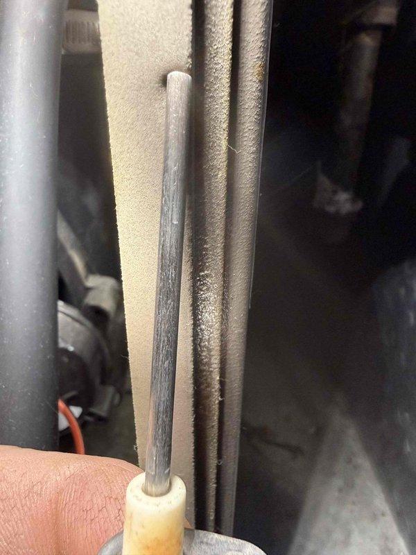 Performed routine BS-MVP heating maintenance visit. Inspected igniter assembly, noting some discoloration and wear on the igniter rod. Examined and verified proper positioning of igniter in ceramic bushing to ensure reliable system operation.