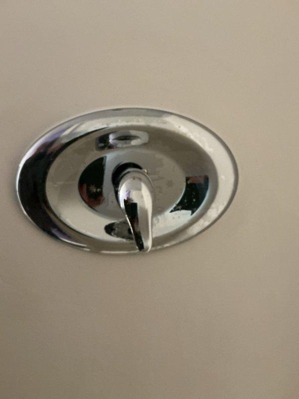 Successfully completed replacement of two shower handle valves and one handle in the bathroom. Installed new chrome fixtures including a lever-style shower control handle and verified proper water flow and operation. All components were properly sealed and tested for leaks before completion.