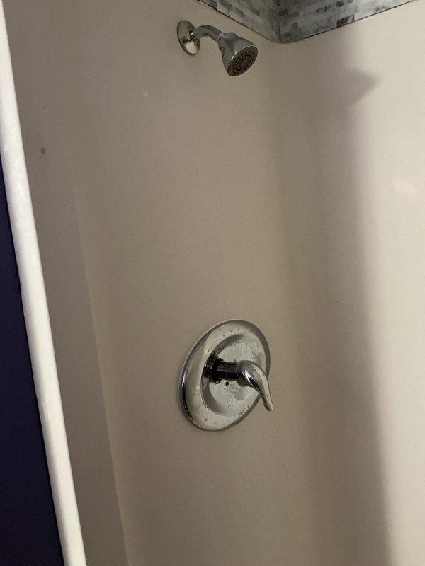 Successfully completed replacement of two shower handle valves and one handle in the bathroom. Installed new chrome fixtures including a lever-style shower control handle and verified proper water flow and operation. All components were properly sealed and tested for leaks before completion.