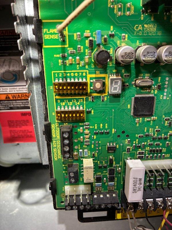 Performed routine MVP furnace maintenance service. Inspected flame sensor and cleaned with appropriate tool to ensure proper operation. Examined control board functionality, confirming proper operation of DIP switch settings and electronic components.