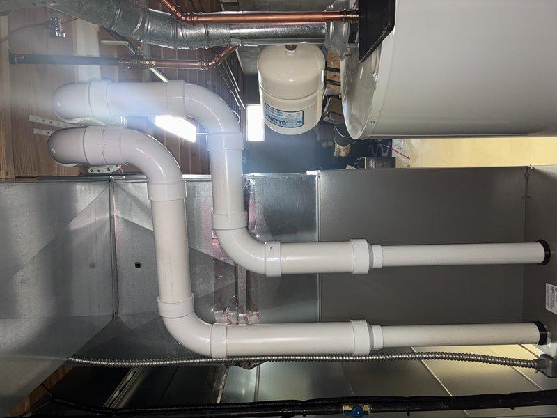 Completed preventative maintenance on 2-year-old furnace. Inspected PVC drainage system, galvanized ductwork, and filtration components - all in good working condition. Checked Aprilaire control panel functionality; display and indicator lights operating normally with proper wire connections.