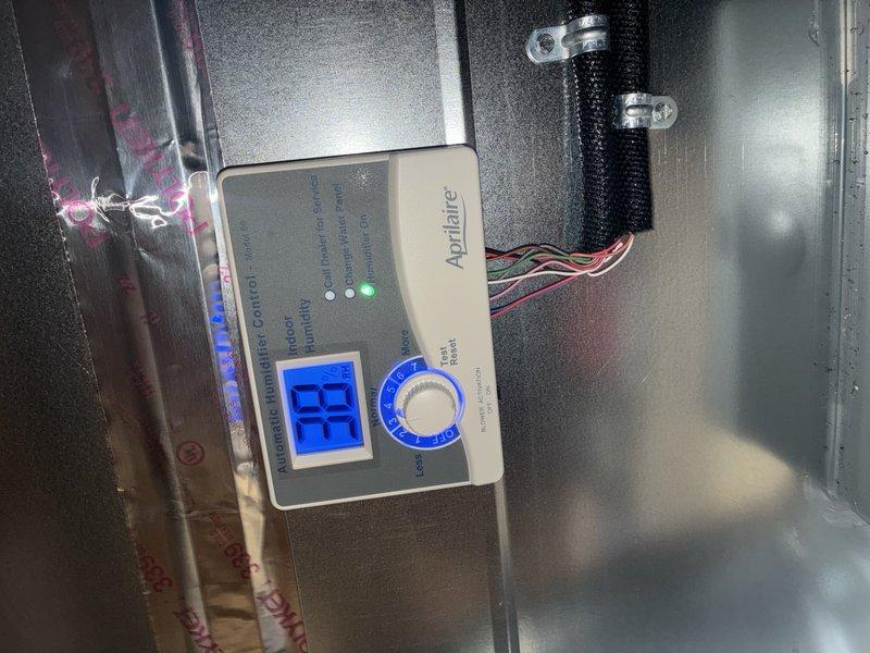 Completed preventative maintenance on 2-year-old furnace. Inspected PVC drainage system, galvanized ductwork, and filtration components - all in good working condition. Checked Aprilaire control panel functionality; display and indicator lights operating normally with proper wire connections.