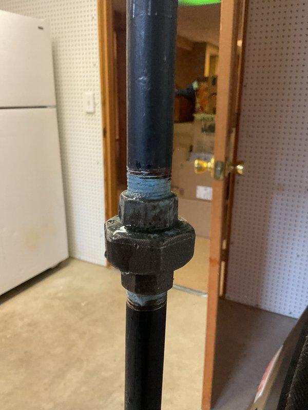 Completed routine heating maintenance on 5-year-old system. Inspected gas line connections and found minor corrosion at threaded union fitting. Performed pressure testing with manometer, confirming proper gas pressure at 0.039 inH2O with system temperature at 65.7°F, all within manufacturer specifications.