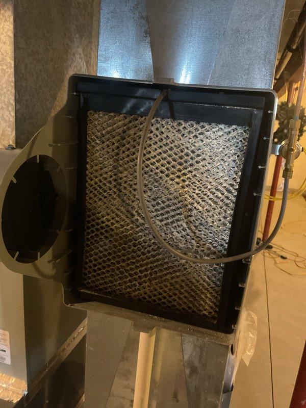 Performed annual maintenance service on an approximately 10-year-old furnace. Inspected and documented condition of filter housing, evaporator coil access, and internal components. Removed front panel to examine electrical connections, circuit boards, and mechanical systems. Unit is functioning properly with no immediate issues identified.