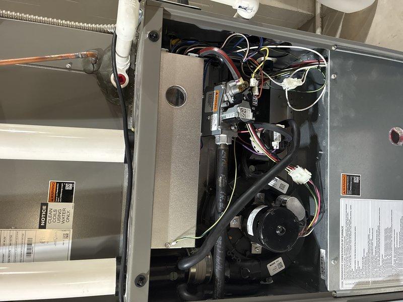 Completed routine maintenance tune-up on a 5-year-old furnace. Inspected circuit board functionality, verified correct operation of temperature sensors (discharge and air sensors), and examined all electrical connections. Checked blower assembly and internal wiring harness for proper operation and wear.
