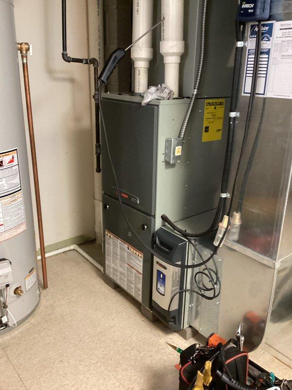 Responded to service call for Trane CleanEffects air filtration system showing multiple indicator lights (red, yellow, and green). Performed diagnostic check on the system, inspected all connections between the filtration unit and the main furnace, and reset the filter monitoring system. Restored proper functionality to the CleanEffects unit, eliminating error indicators and ensuring optimal air purification performance.