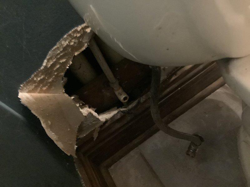 Responded to emergency call for burst waterline in 30-year-old residence bathroom. Excavated damaged drywall to access failed supply line, replaced compromised section with new PEX piping, and installed new shutoff valve. Additionally, replaced deteriorated cast iron drain pipe connection in basement with modern PVC coupling to prevent future issues.