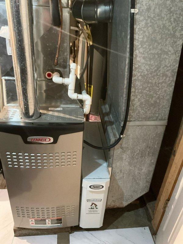Diagnosed and repaired a 3-year-old Lennox furnace that was shutting down shortly after startup. Inspection revealed corrosion on critical electrical connections with visible damage to the flame sensor terminal, which was causing improper flame detection and system shutdown. Cleaned corroded components, replaced flame sensor, and verified proper system operation through multiple heating cycles.