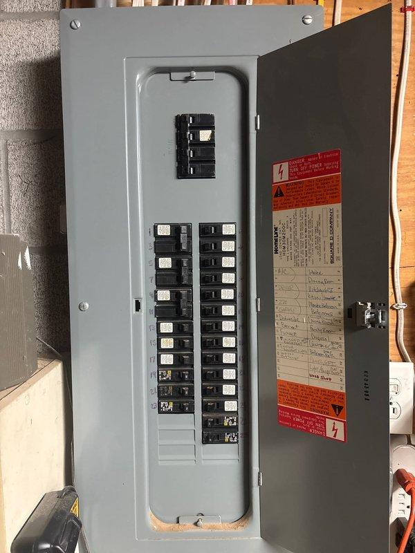 Confirmed electrical wiring update quote with customer. Performed inspection of electrical panel, which revealed approximately 20 circuit breakers in good working condition with proper labeling. Service completed as quoted, with photographs taken of the breaker panel and access area for documentation.