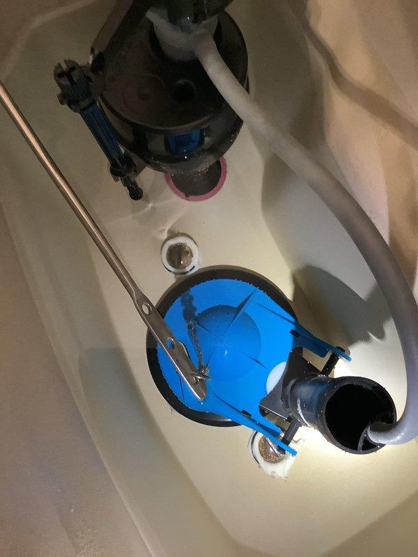 Responded to service call for a leaking toilet. Upon inspection, removed tank lid and identified issue with the flush valve assembly. Replaced faulty components, verified proper water level, and tested for leaks. Toilet now functioning correctly with no leakage.