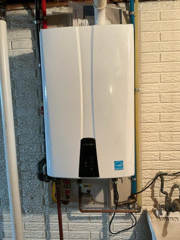 Successfully replaced defective check valve in Navien tankless water heater system as scheduled. Accessed interior components, disconnected relevant plumbing connections, installed new check valve, and restored system to proper operation. Unit now functioning correctly with no leaks observed during testing.