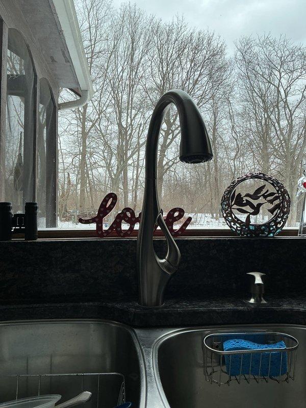 Successfully replaced customer-supplied kitchen faucet with new mounting hardware and shutoff valves. Installed new InSinkErator 3/4 HP garbage disposal with quiet technology to replace aging unit. All connections tested and functioning properly with no leaks.