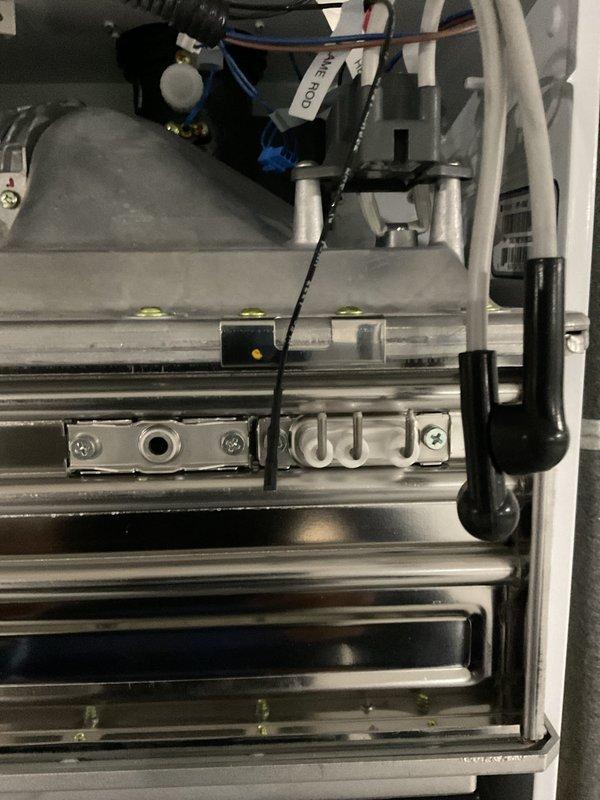 Performed routine maintenance tune-up on 3-year-old furnace. Removed front panel to inspect internal components including blower motor, wiring connections, and ventilation system. All components found in normal working condition with no visible damage or abnormal buildup.
