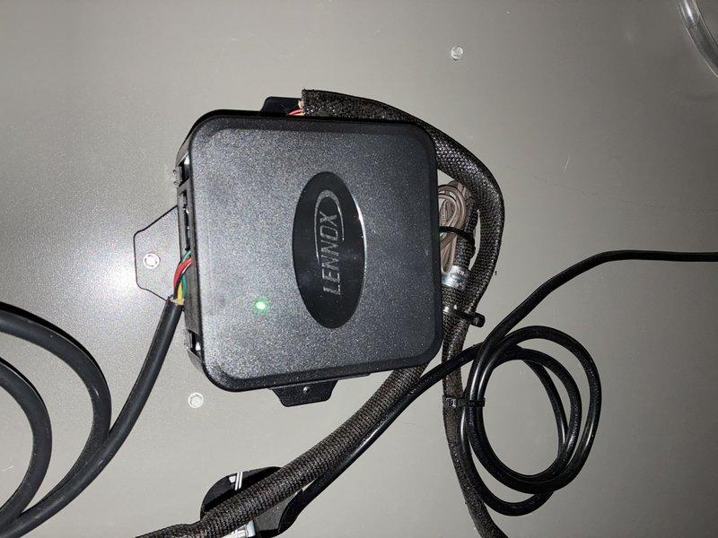 Completed scheduled BS-MVP Heating Visit on 10-year-old system. Inspected Lennox control module which was operational with proper wire connections and illuminated indicator light. Examined air filter which showed normal usage wear with intact diamond-pattern mesh and frame structure.