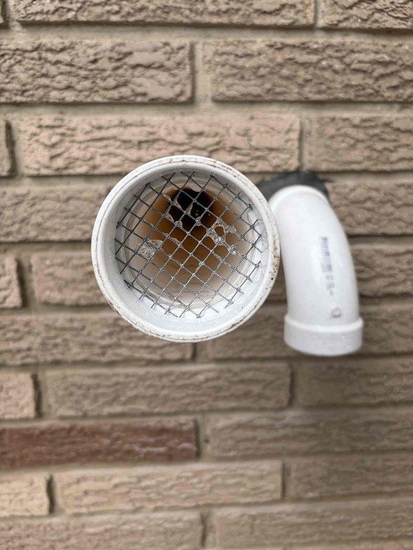 Installed proper support brackets for HVAC vent and intake pipes as required by inspection standards. Added protective screens to vent and intake discharge pipes to prevent debris entry while maintaining proper airflow, bringing installation into compliance with code requirements.